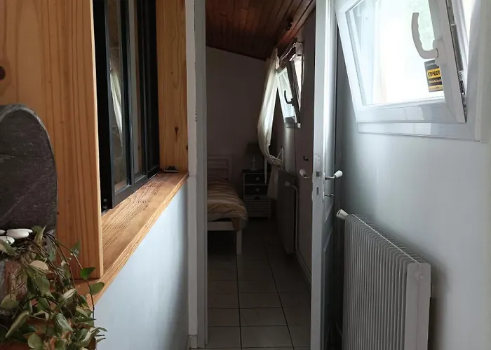 Проживання в сім'ї Cosy Et Salle D'eau Dans Maison Arlac *